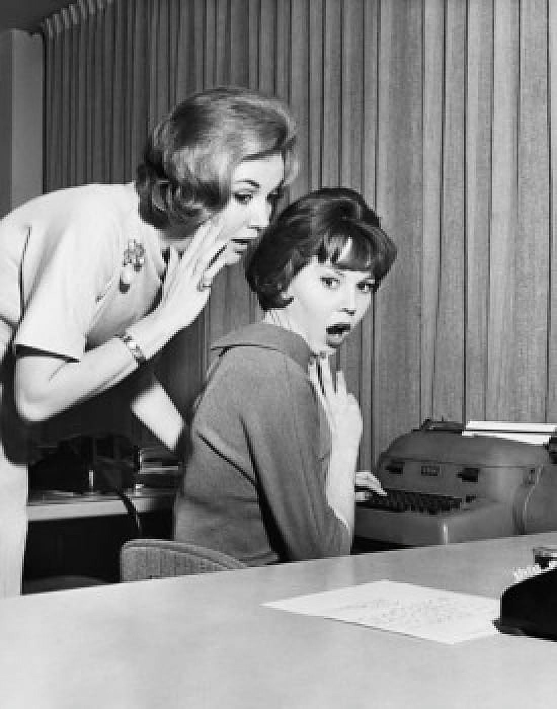 Side profile of a businesswoman whispering to another businesswoman in an office Canvas Art - (24 x 36)