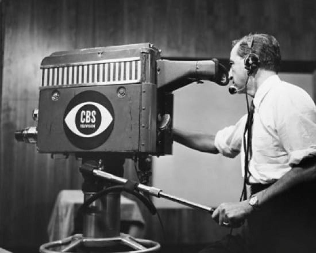 Side profile of a cameraman operating a television camera Canvas Art - (18 x 24)