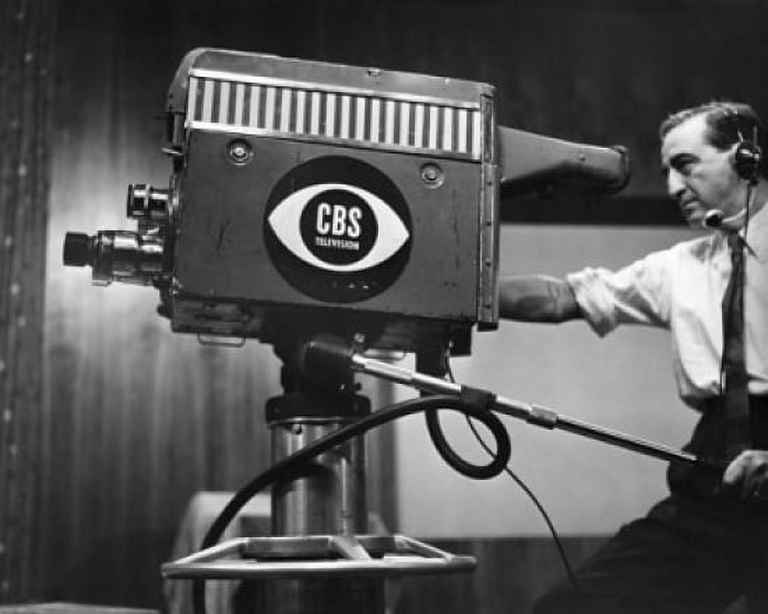 Side profile of a cameraman shooting in a television studio Canvas Art - (24 x 36)