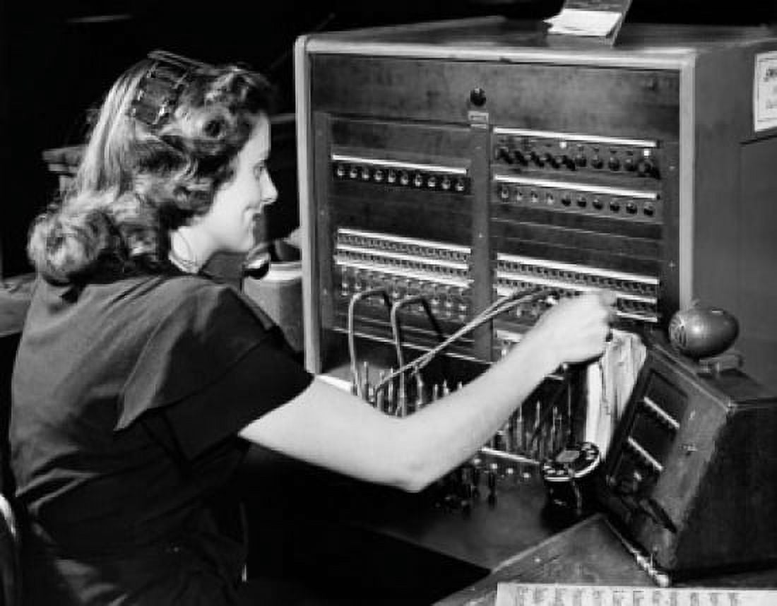 Side profile of a female telephone operator operating a switchboard Canvas Art - (24 x 36)