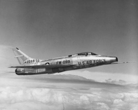 Side profile of a fighter plane in flight F-100C Super Sabre Canvas Art -  (18 x 24)
