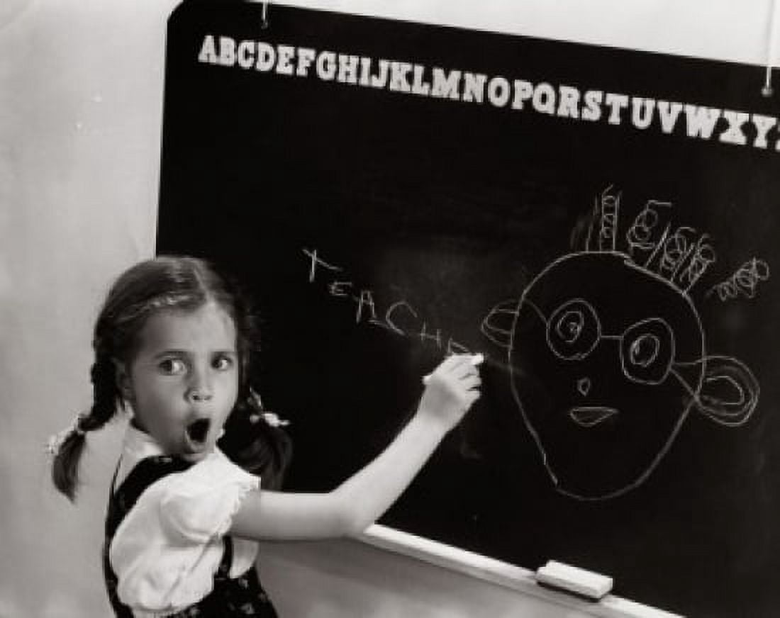 Side profile of a girl drawing a cartoon of her teacher on the blackboard Canvas Art - (24 x 36)