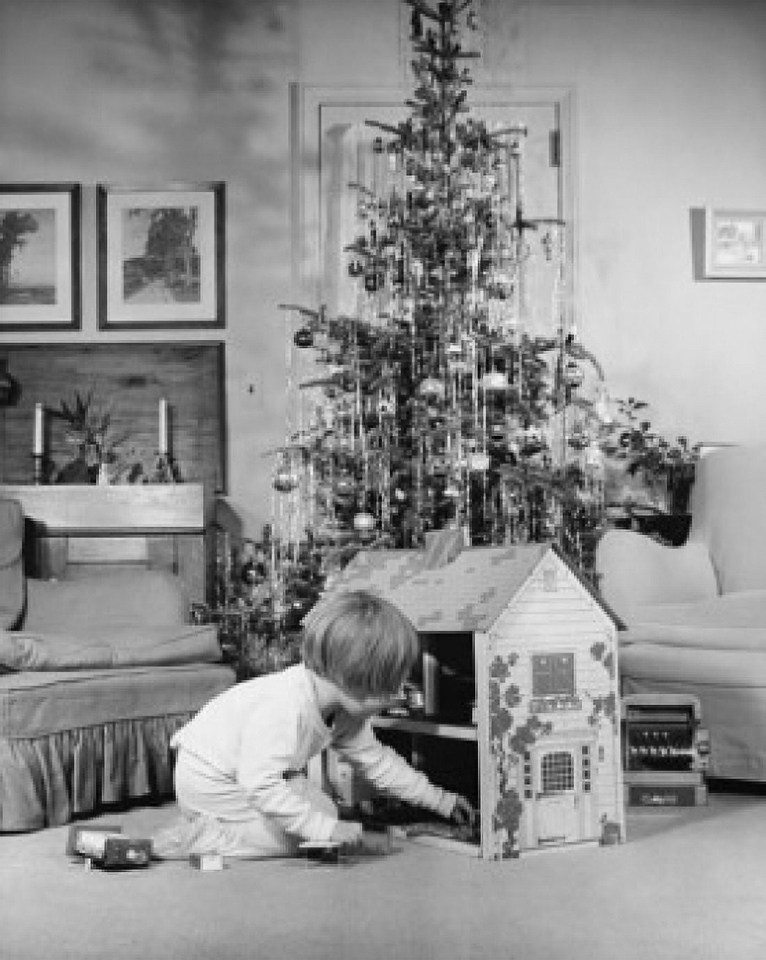 Side profile of a girl playing with a dollhouse Canvas Art - (18 x 24)