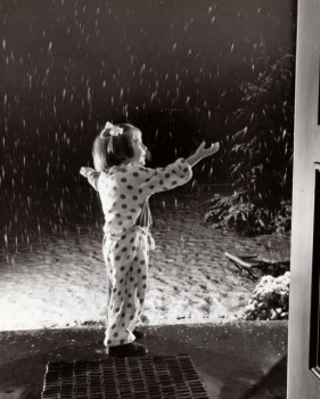 Side profile of a girl watching snow falling Canvas Art - (24 x 36)