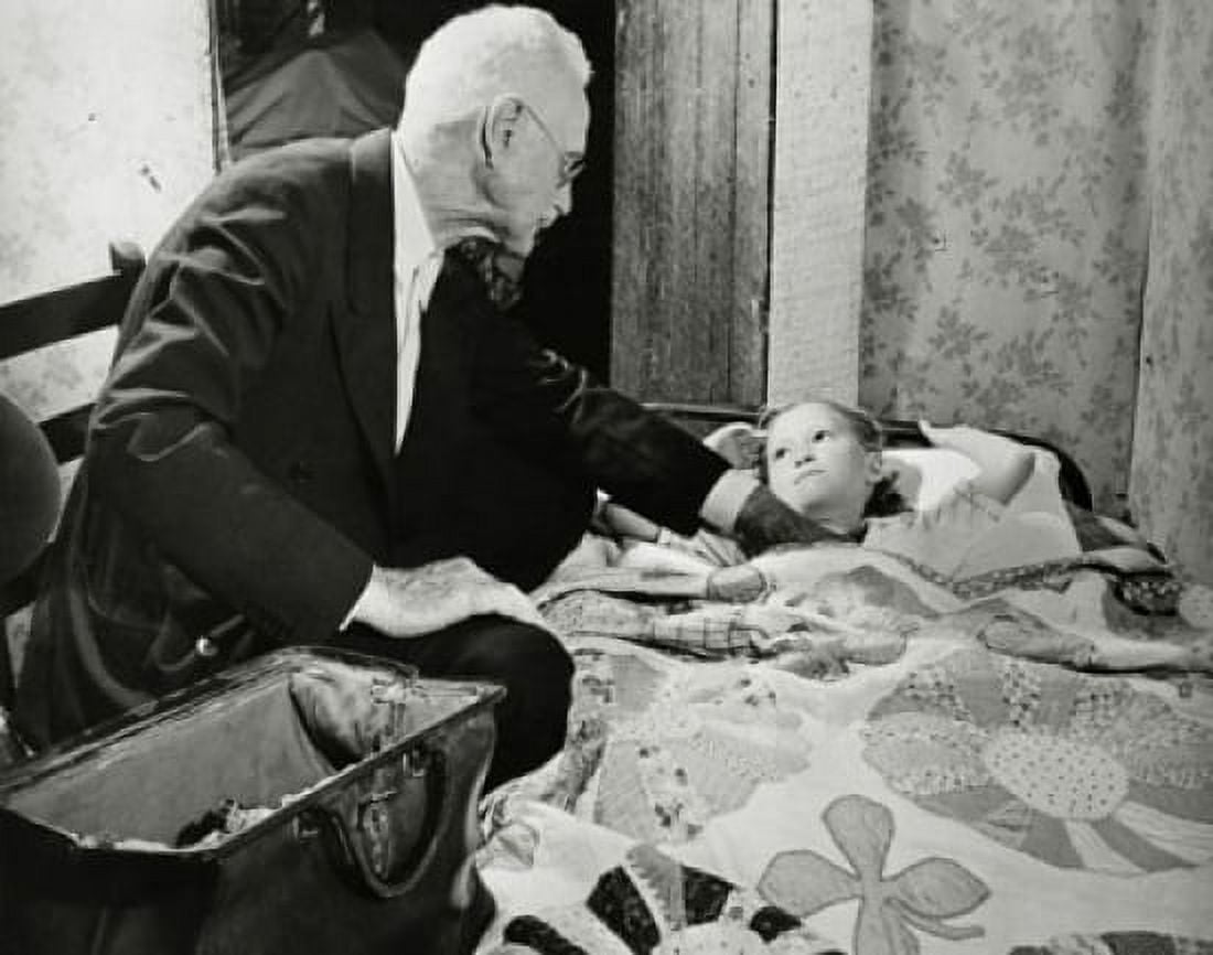 Side profile of a male doctor examining a girl Canvas Art - (18 x 24)