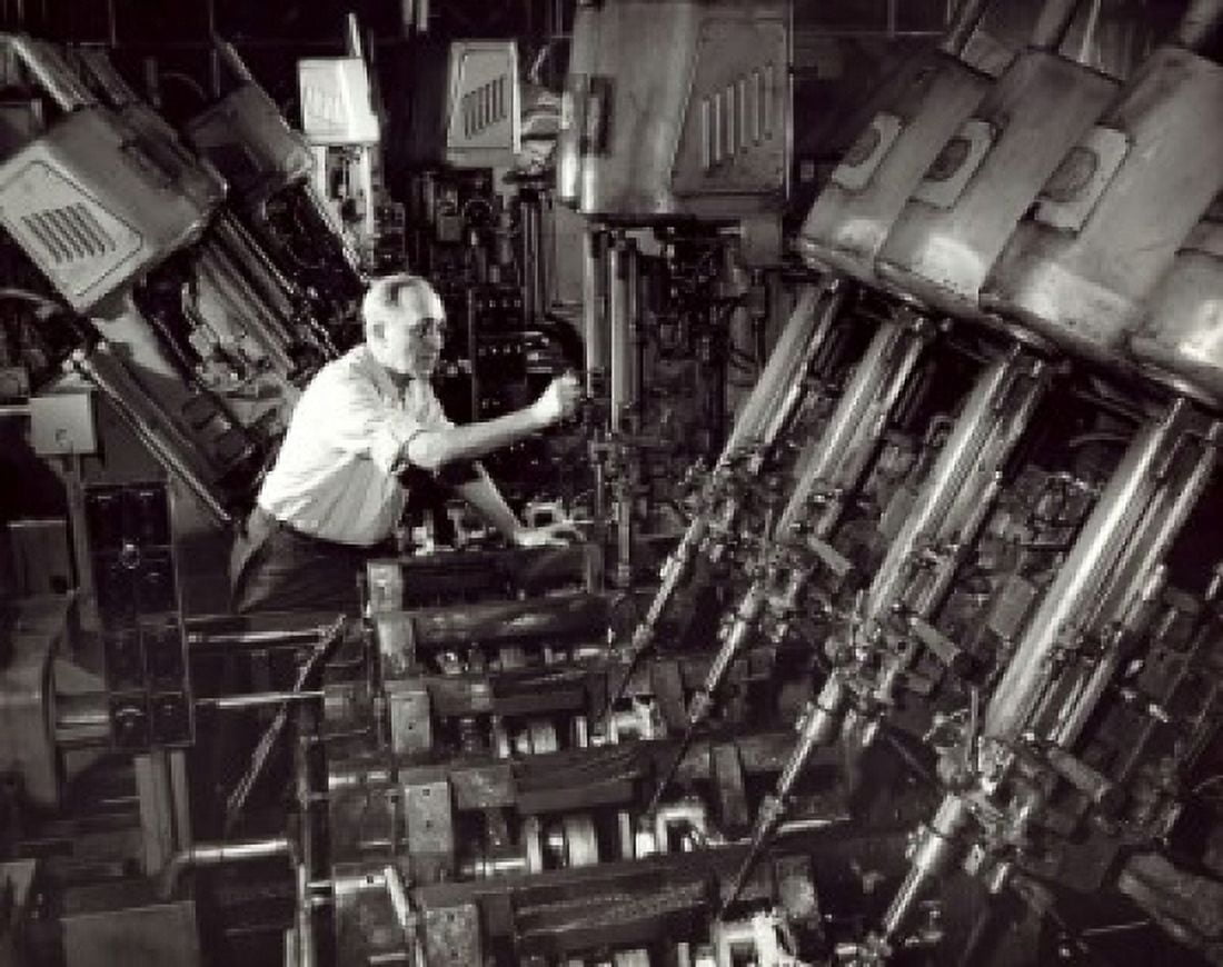 Side profile of a male working in a factory Crankshaft Oil System Drill Ford Motor Company Dearborn Michigan USA Canvas Art -  (18 x 24)