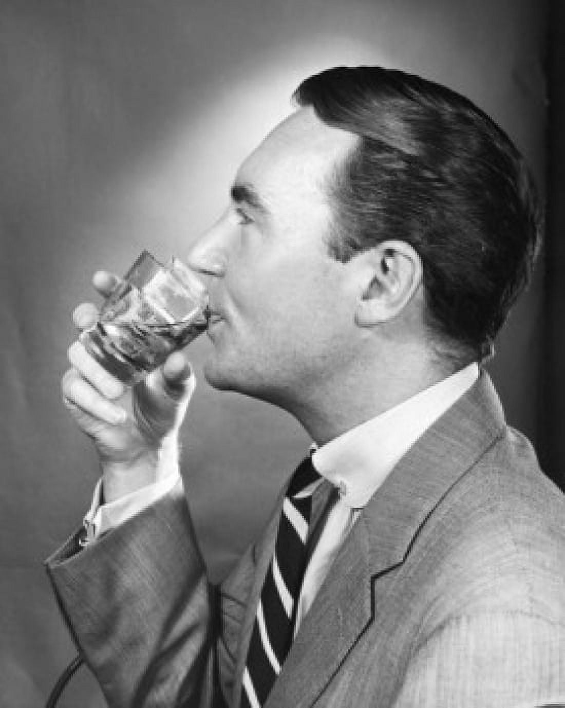 Side profile of a mature man drinking Canvas Art - (18 x 24)