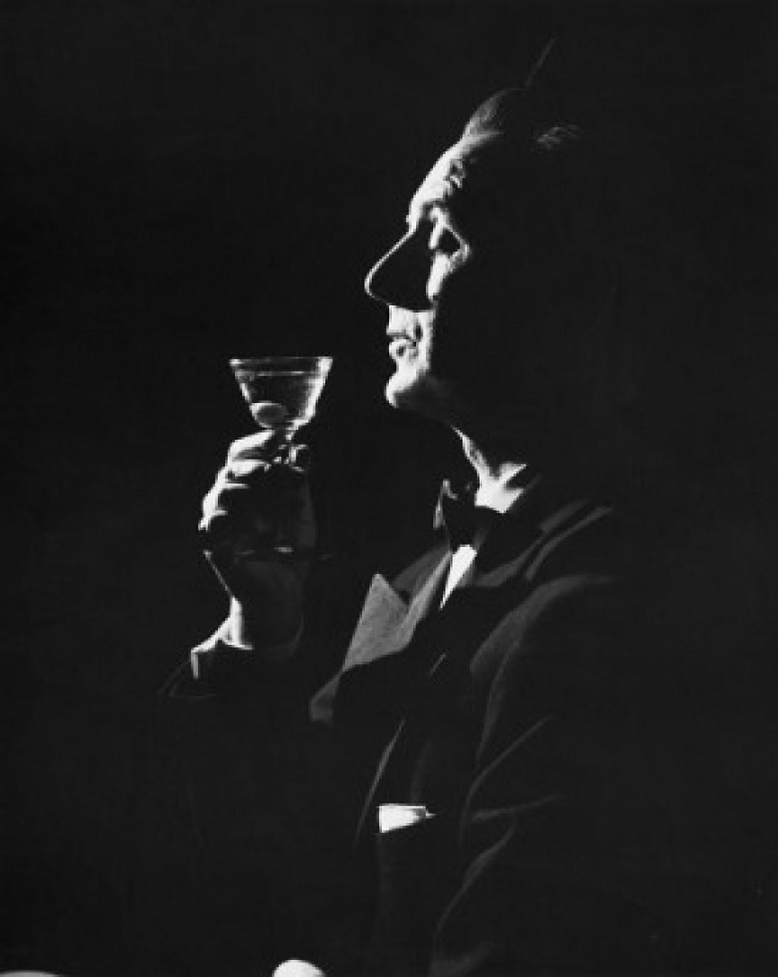 Side profile of a mature man holding a martini Canvas Art - (18 x 24)