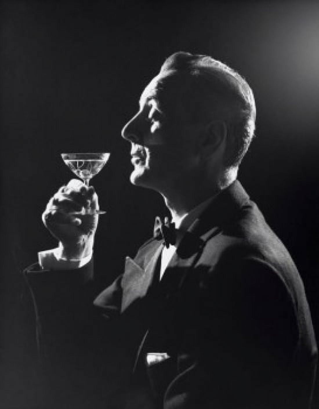 Side profile of a mature man holding a martini Canvas Art - (24 x 36)