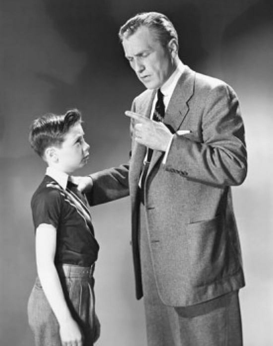 Side profile of a mature man scolding his son Canvas Art -  (18 x 24)
