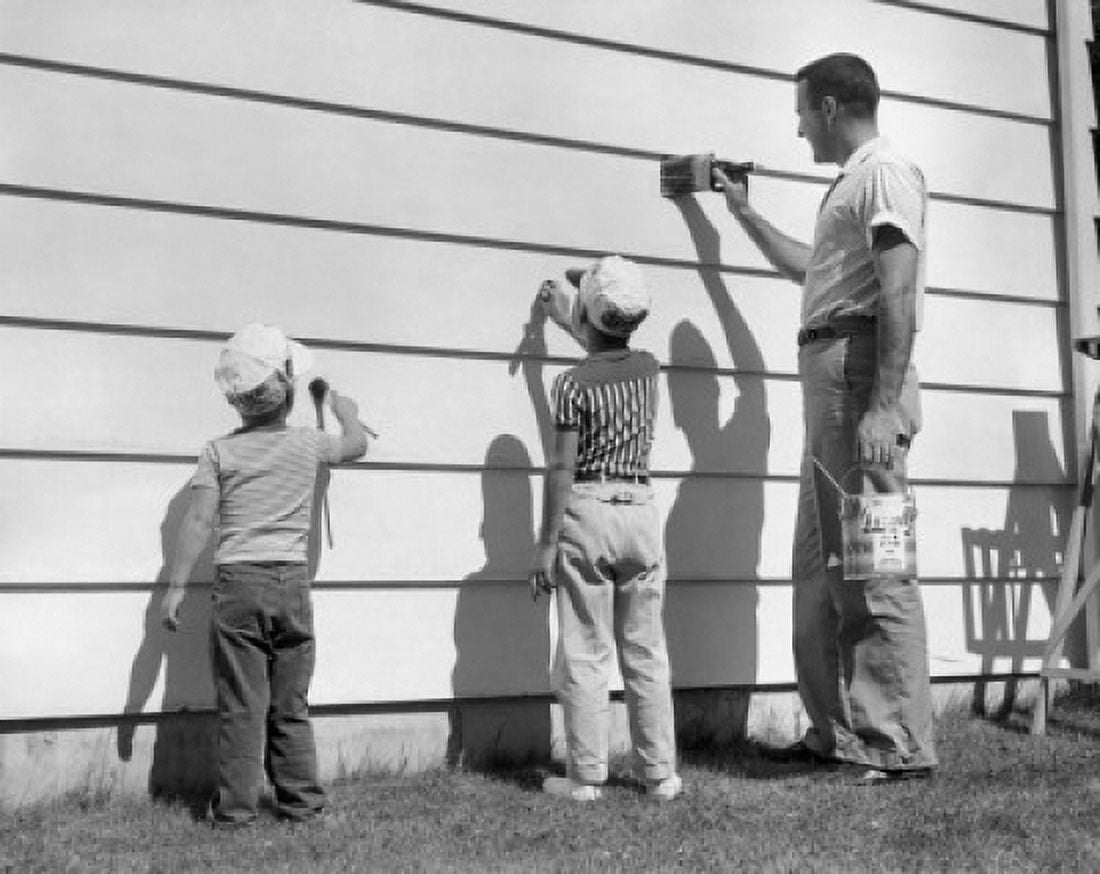 Side profile of a mature man with his two sons painting a wall Canvas Art - (24 x 36)