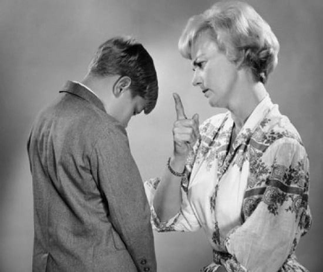 Side profile of a mature woman scolding her son Canvas Art - (24 x 36)