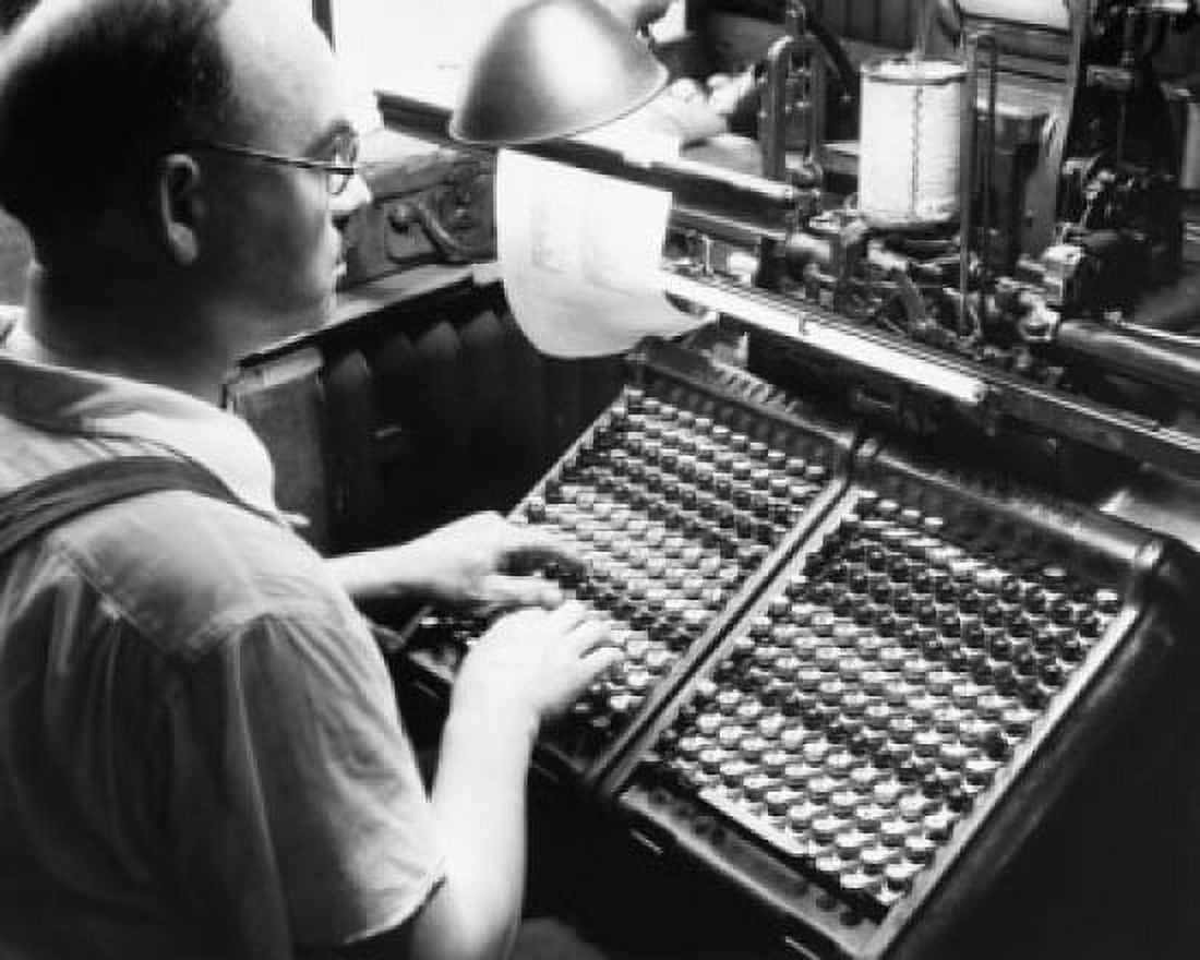 Side profile of a mid adult man operating a monotype machine Canvas Art - (18 x 24)