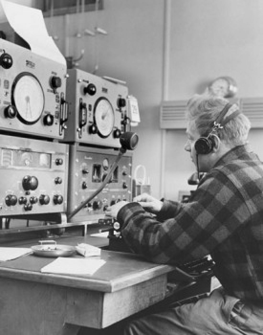 Side profile of a mid adult man sitting in a radio station Canvas Art - (24 x 36)
