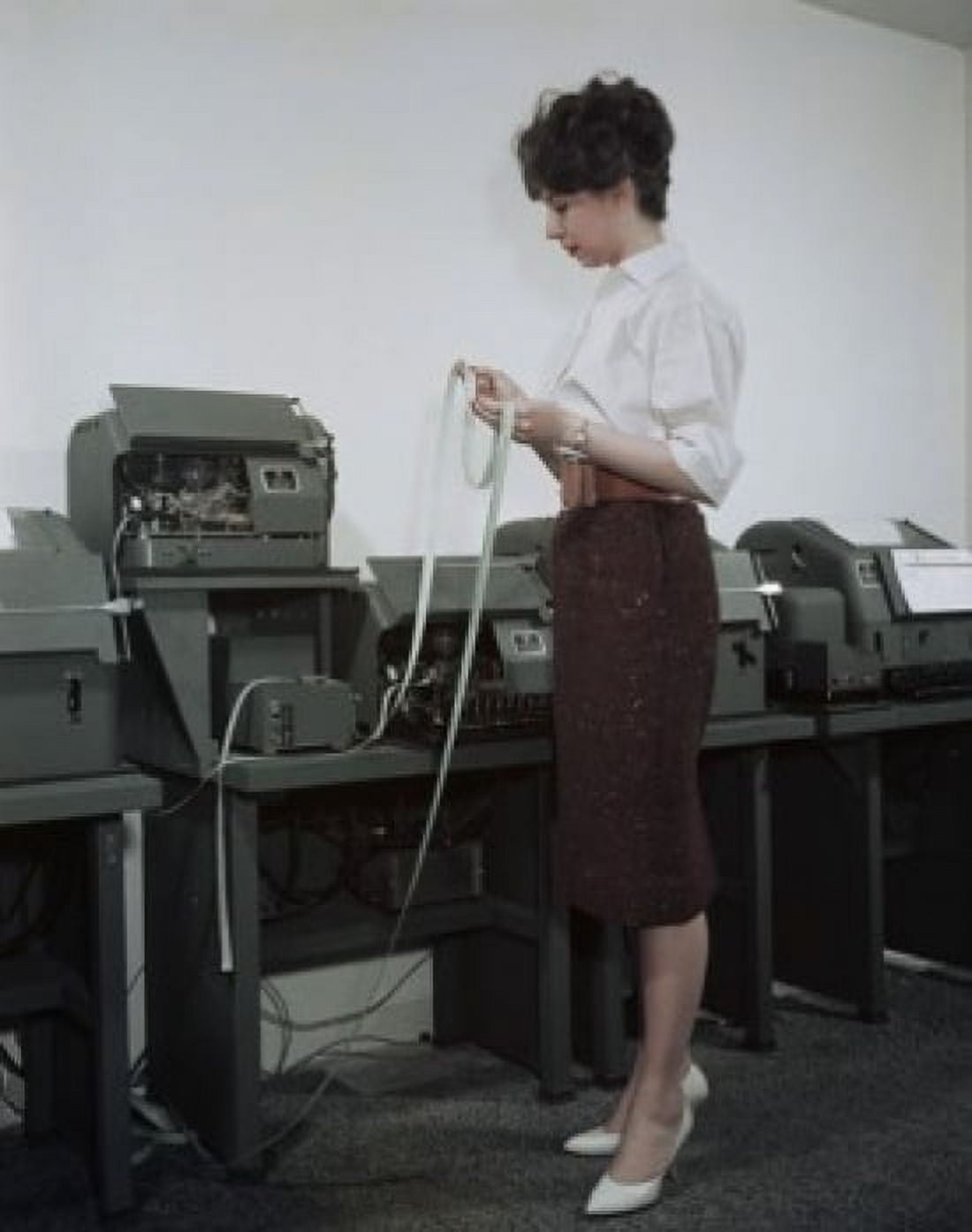 Side profile of a mid adult woman reading a ticker tape Canvas Art - (18 x 24)