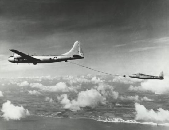 Side profile of a military tanker airplane refueling in flight B-29 Superfortress F-84 Thunderjet Canvas Art - (18 x 24)