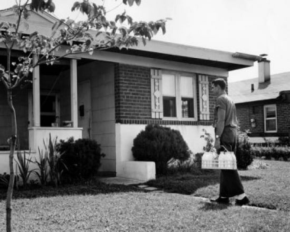 Side profile of a milkman delivering milk Canvas Art - (24 x 36)
