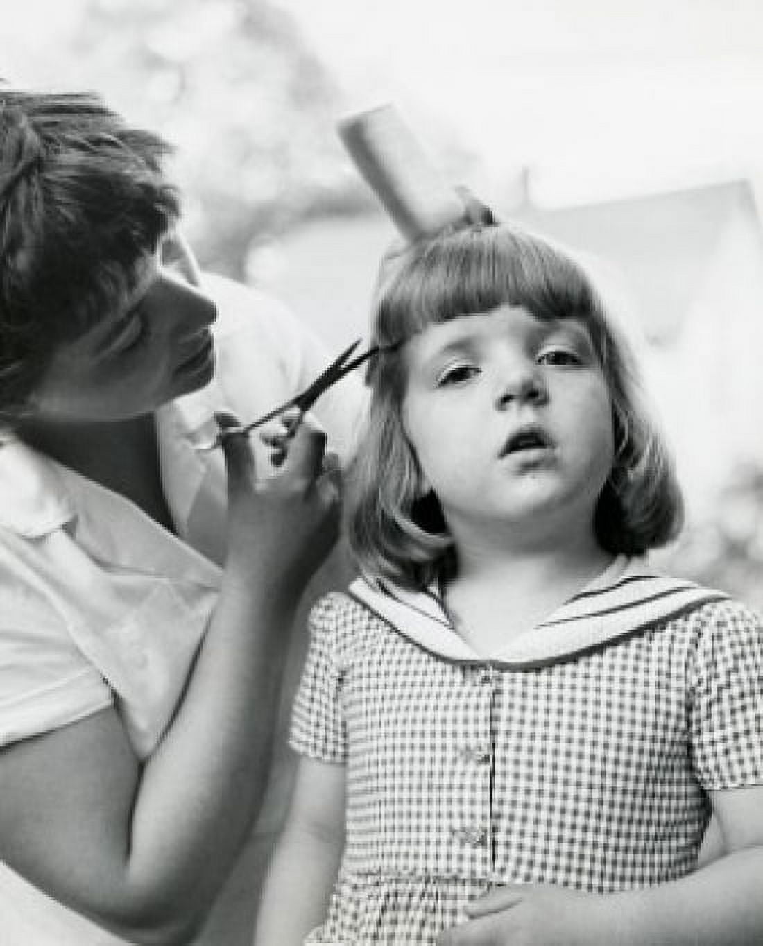 Side profile of a mother cutting her daughters hair Canvas Art - (18 x 24)