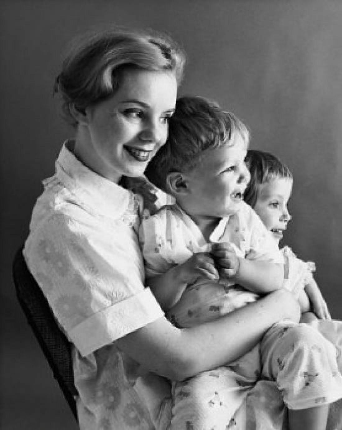 Side profile of a mother sitting with her children Canvas Art - (24 x 36)