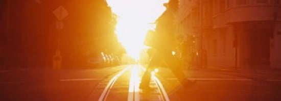 Side profile of a person crossing the cable car tracks at sunset San Francisco California USA Canvas Art - Panoramic Images (36 x 13)