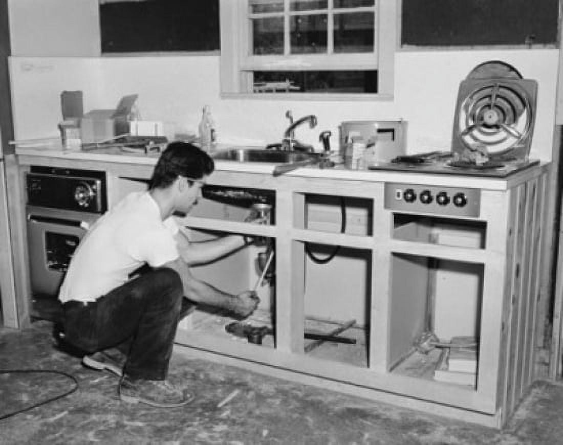 Side profile of a plumber working on a kitchen sink Canvas Art -  (24 x 36)