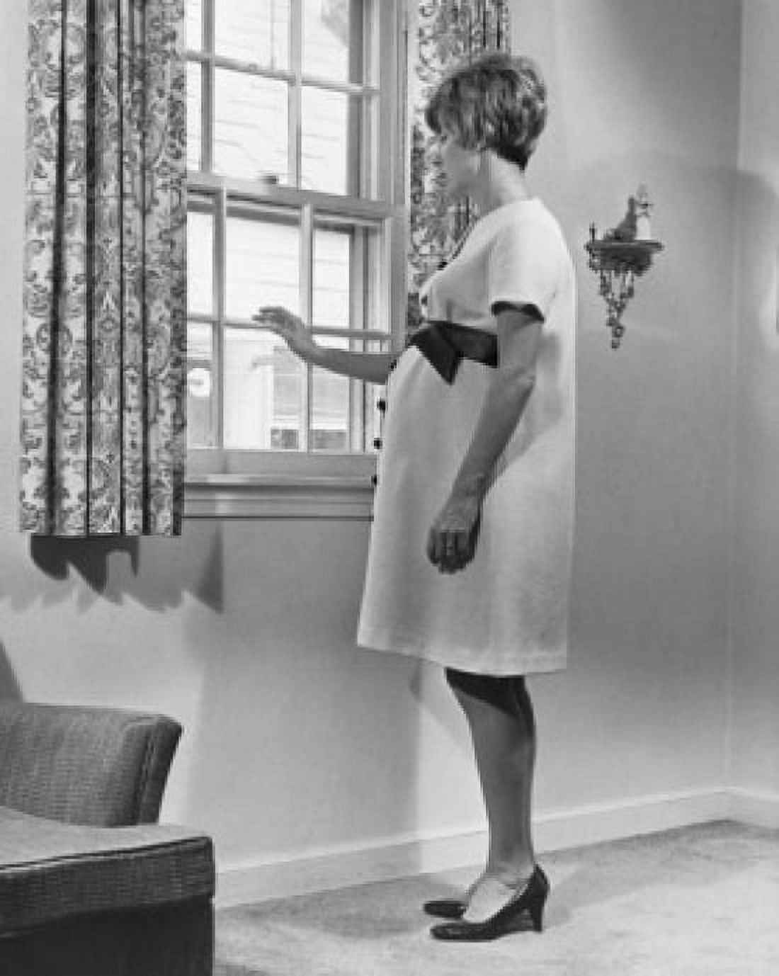 Side profile of a pregnant woman looking through a window Canvas Art - (24 x 36)
