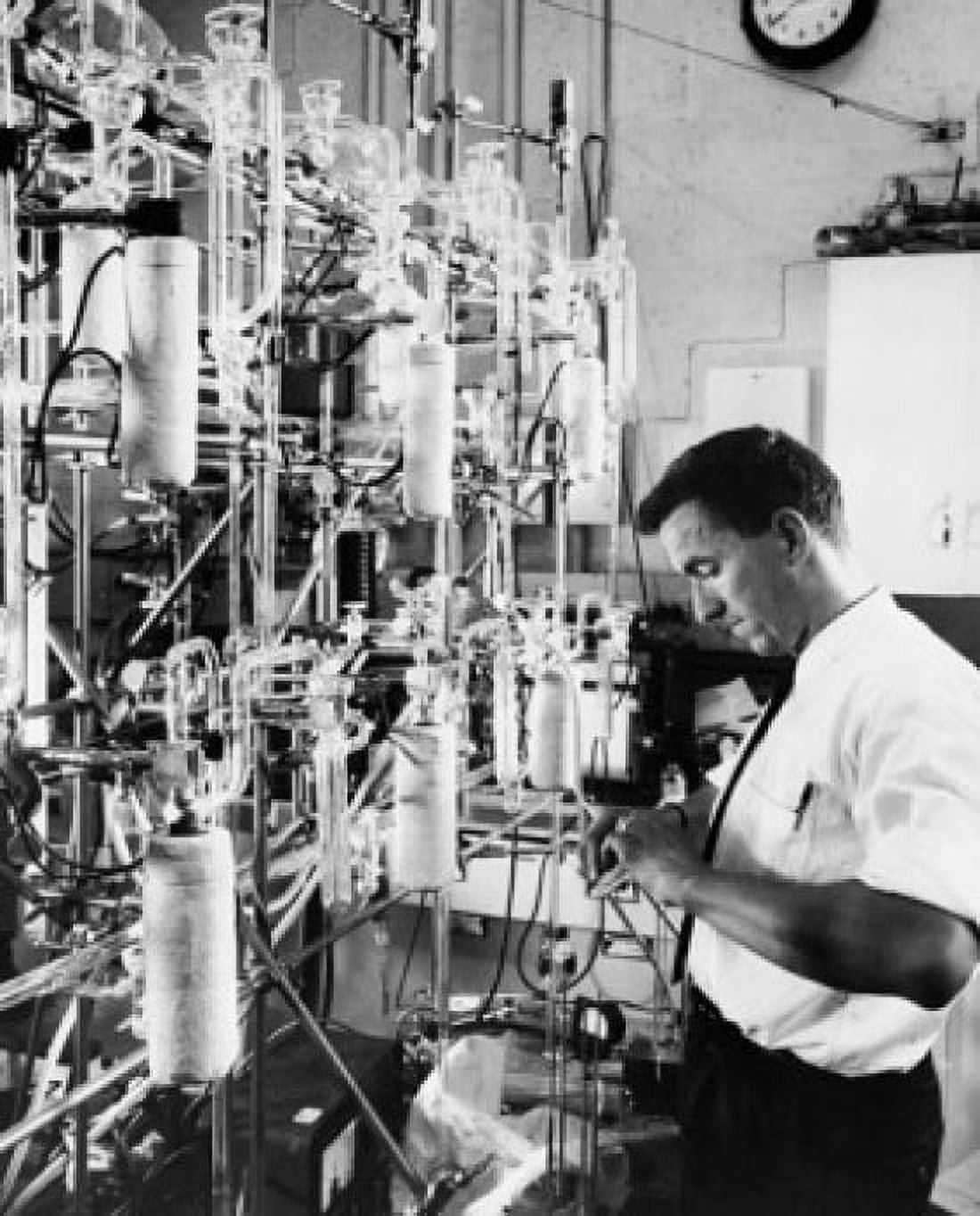 Side profile of a scientist determining the age of rocks by measuring the traces of radioactivity Cambridge Massachusetts USA Canvas Art -  (24 x 36)