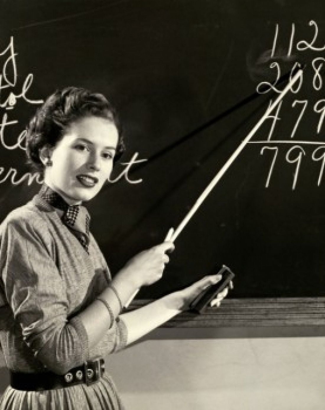 Side profile of a teacher pointing to a blackboard Canvas Art - (18 x 24)
