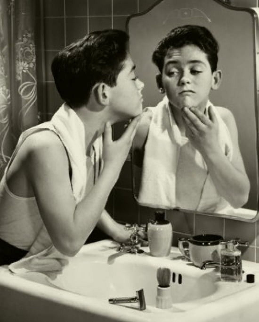 Side profile of a teenage boy looking at his reflection Canvas Art - (18 x 24)