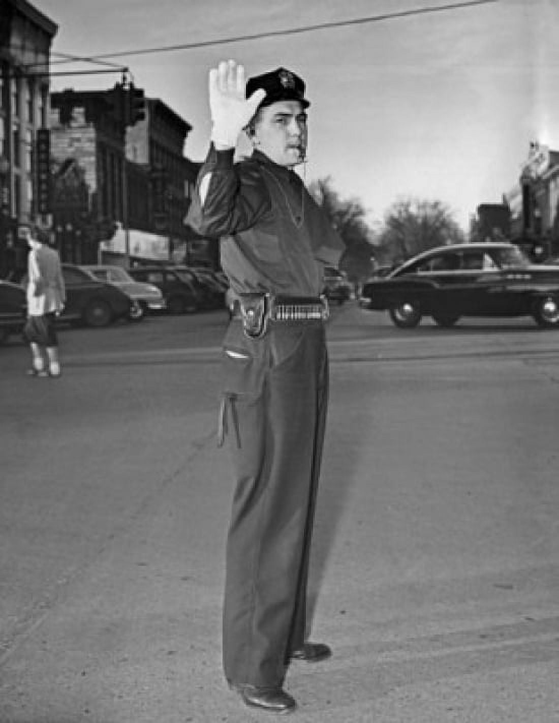 Side profile of a traffic cop gesturing to stop and whistling Canvas Art - (24 x 36)