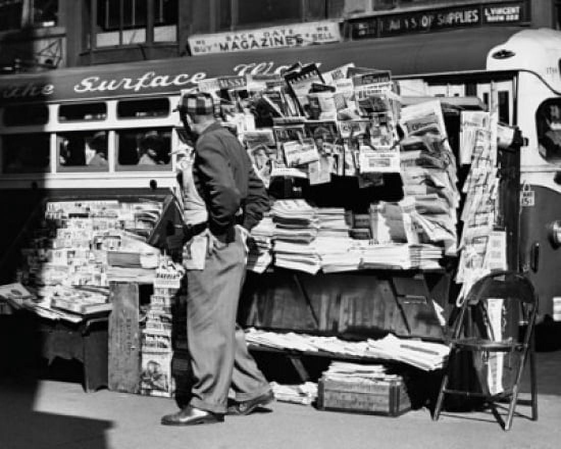 Side profile of a vendor standing in front of his news stand New York City USA Canvas Art -  (18 x 24)