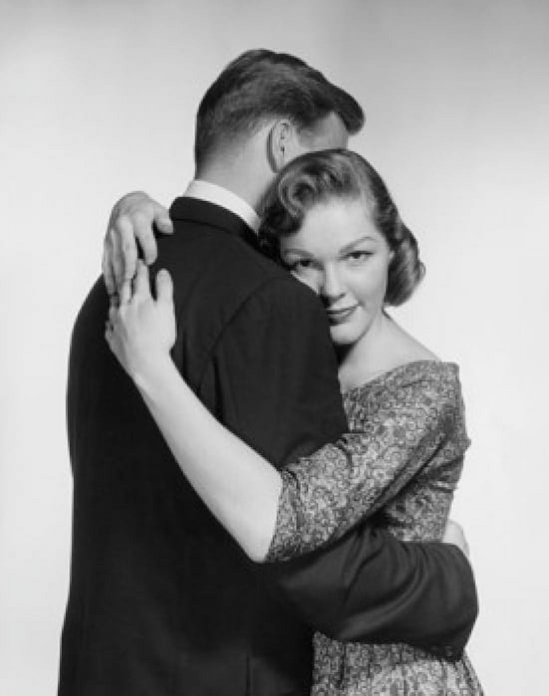 Side profile of a young couple embracing Canvas Art - (18 x 24)