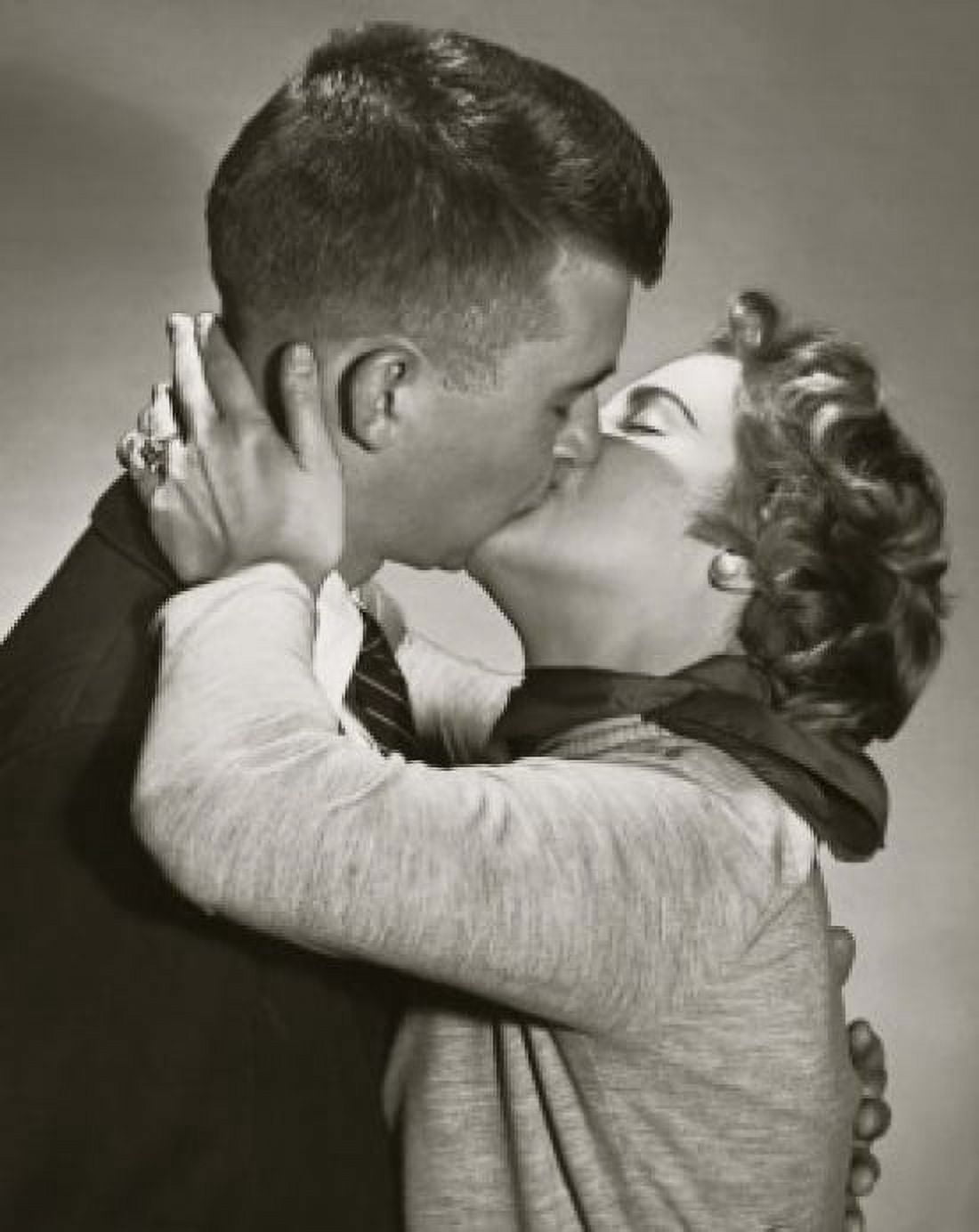 Side profile of a young couple kissing Canvas Art - (18 x 24)