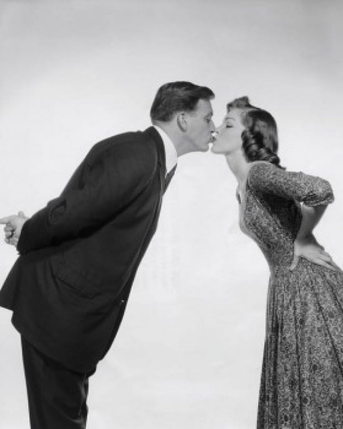 Side profile of a young couple kissing Canvas Art - (24 x 36)