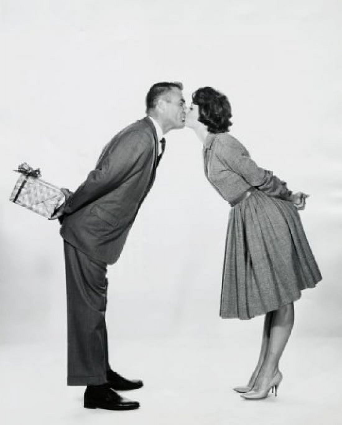 Side profile of a young couple kissing each other Canvas Art - (18 x 24)
