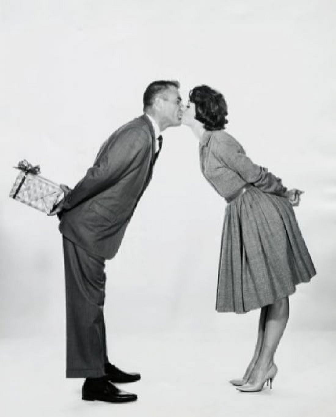 Side profile of a young couple kissing each other Canvas Art - (24 x 36)