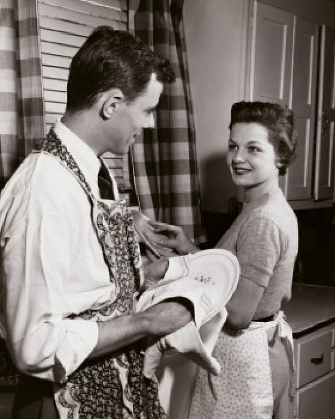 Side profile of a young couple washing dishes in the kitchen Canvas Art - (18 x 24)
