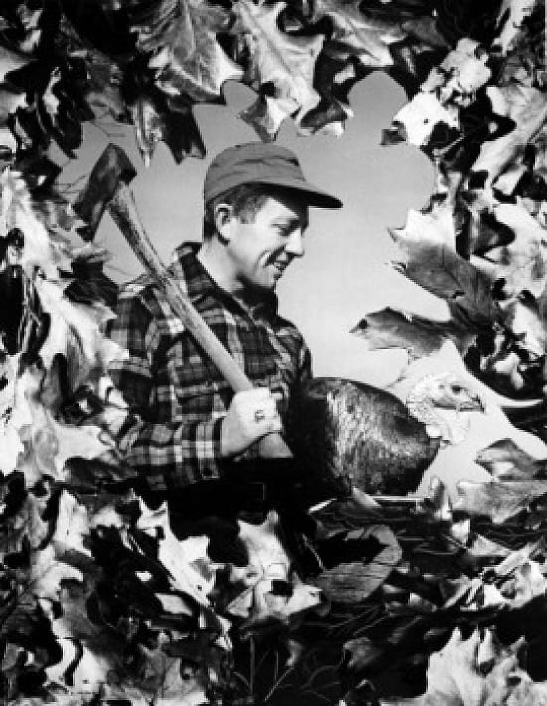Side profile of a young man carrying a turkey and an axe Canvas Art - (24 x 36)