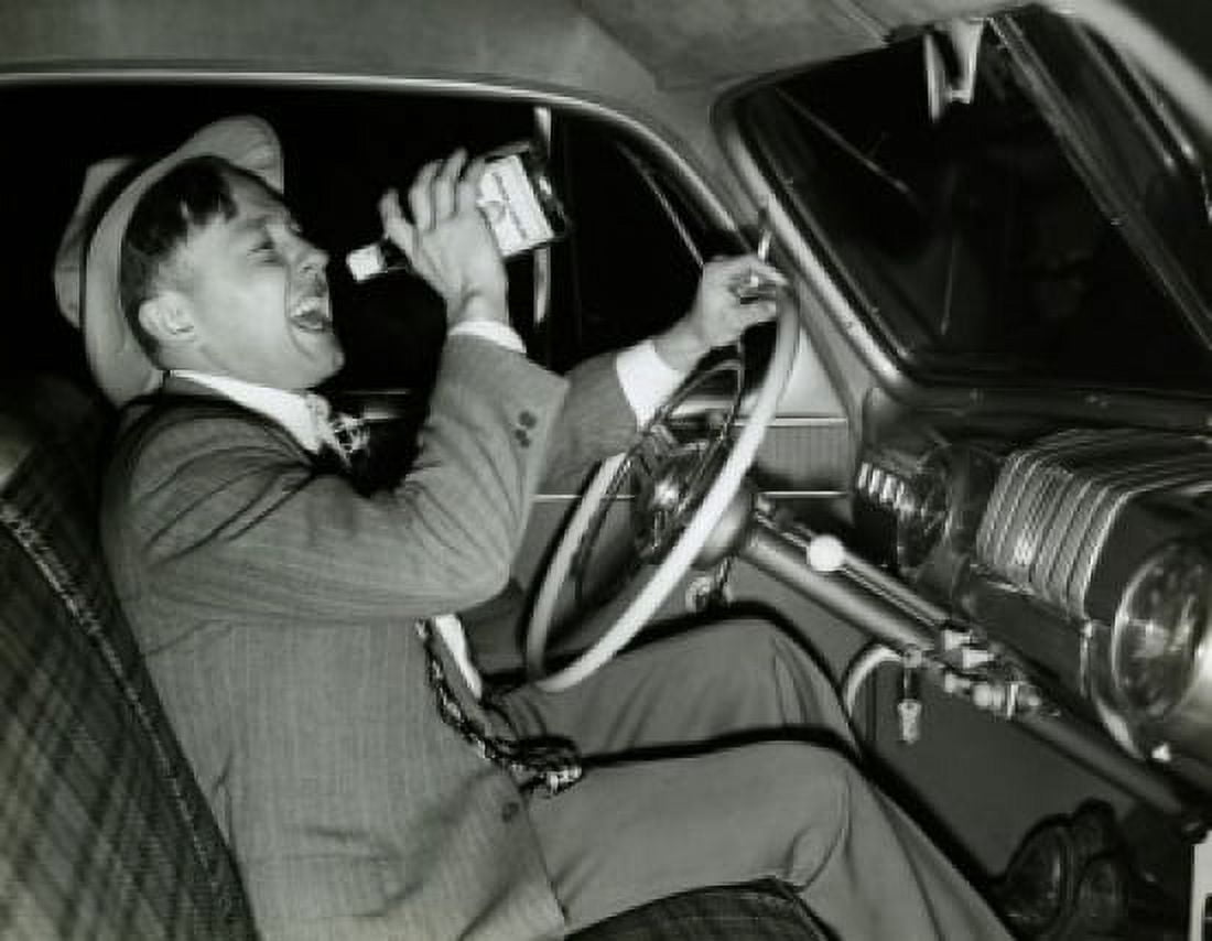 Side profile of a young man driving a car while drinking alcohol Canvas Art - (18 x 24)