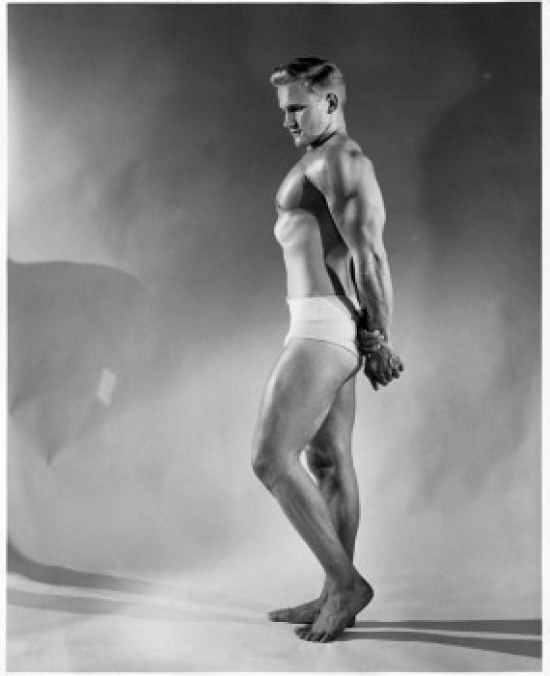 Side profile of a young man flexing his muscles Canvas Art - (18 x 24)