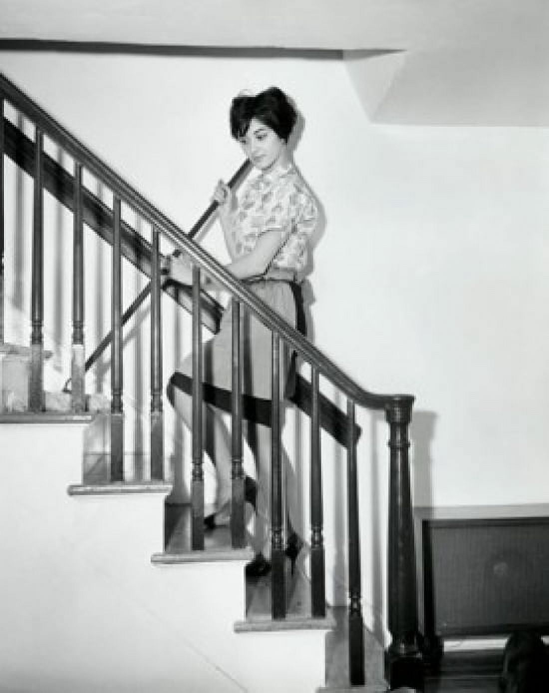 Side profile of a young woman cleaning stairs with a mop Canvas Art - (18 x 24)