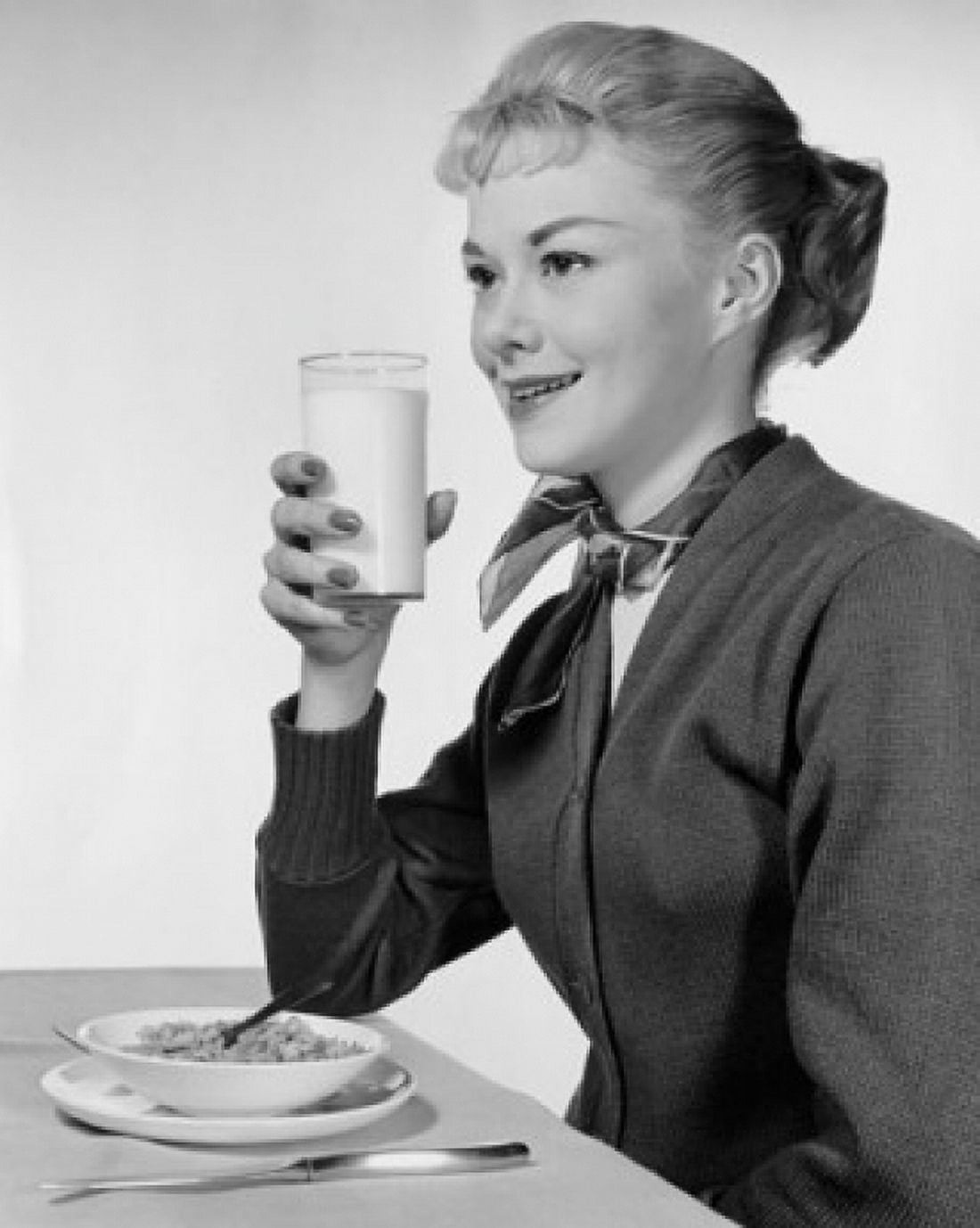 Side profile of a young woman eating breakfast Canvas Art - (24 x 36)