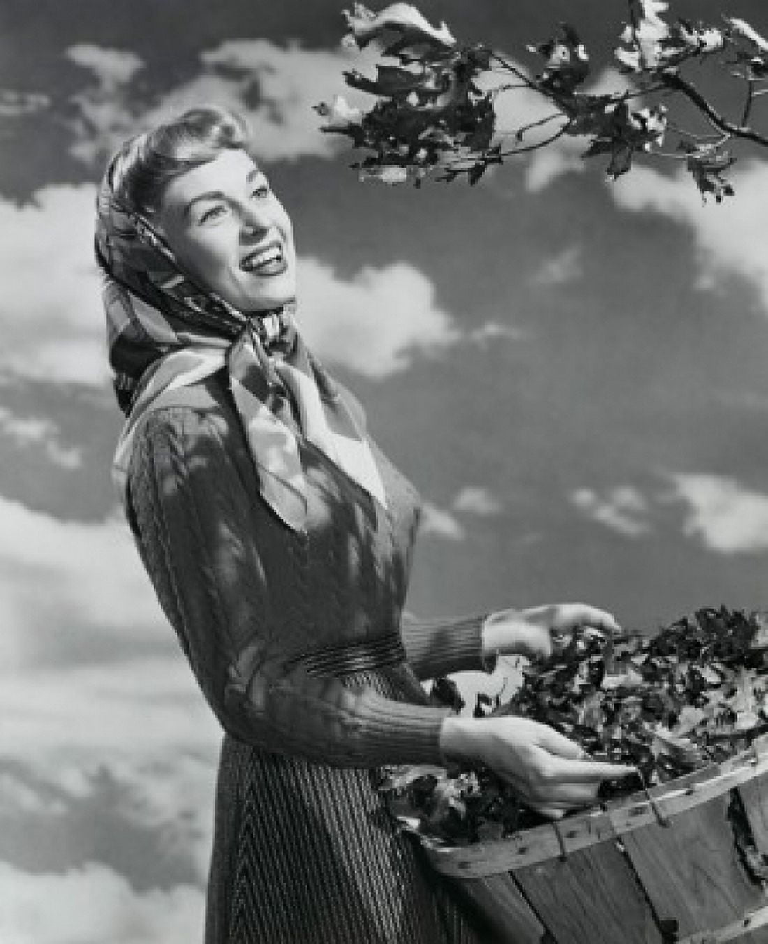 Side profile of a young woman holding a basket Canvas Art - (24 x 36)