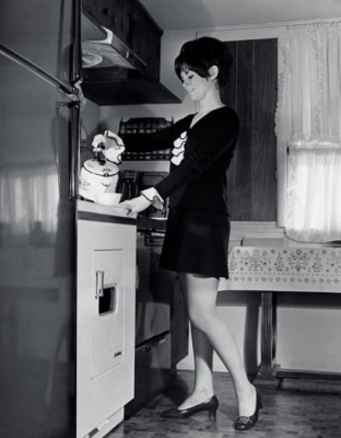 Side profile of a young woman pouring tea from a kettle Canvas Art - (18 x 24)