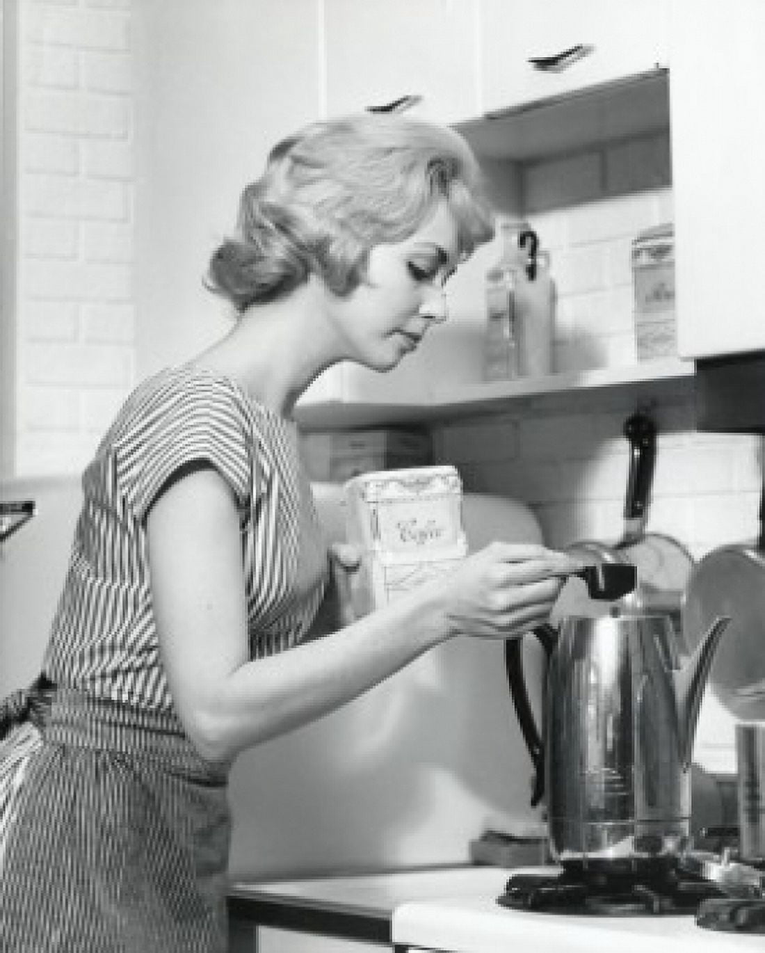 Side profile of a young woman preparing coffee Canvas Art - (24 x 36)