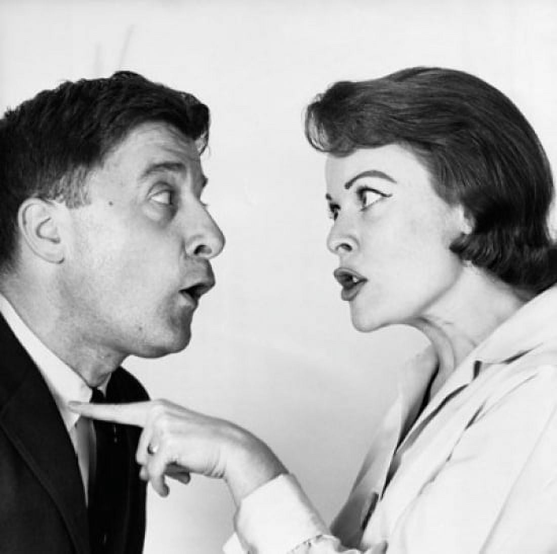 Side profile of a young woman shouting on a young man Canvas Art - (24 x 36)
