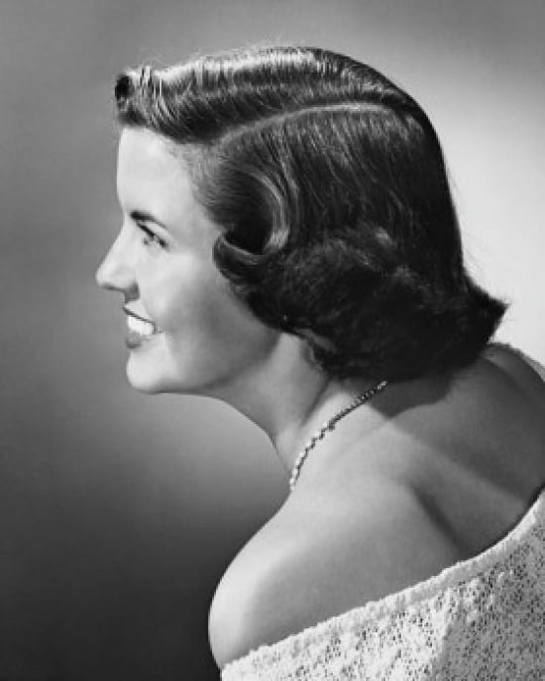 Side profile of a young woman smiling Canvas Art - (24 x 36)