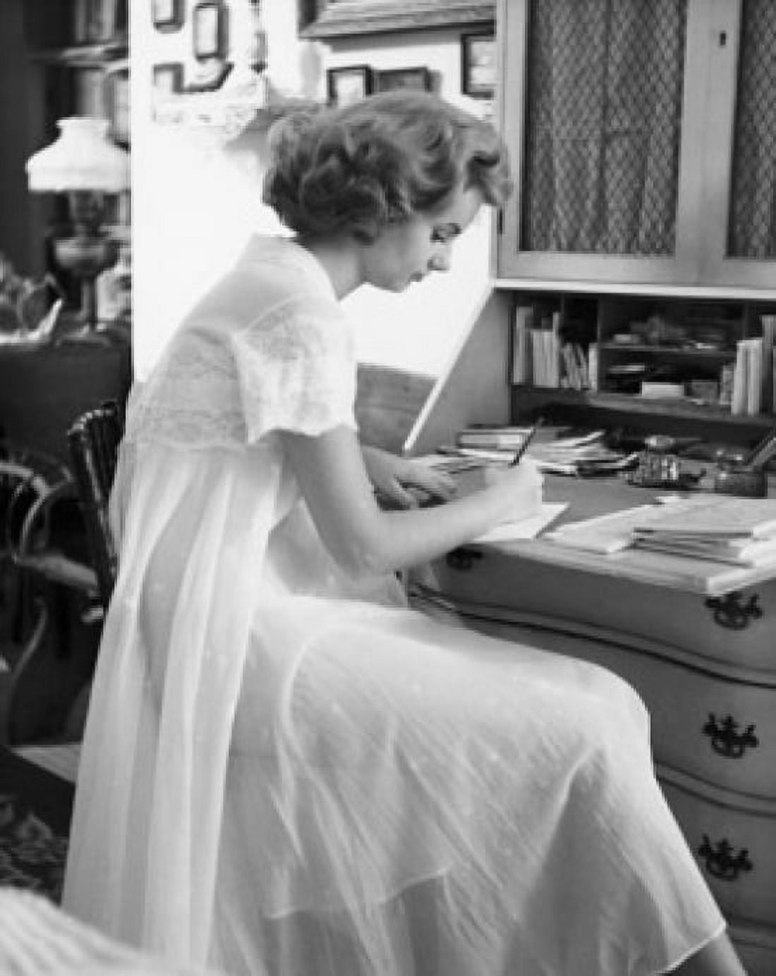 Side profile of a young woman writing a letter Canvas Art - (24 x 36)