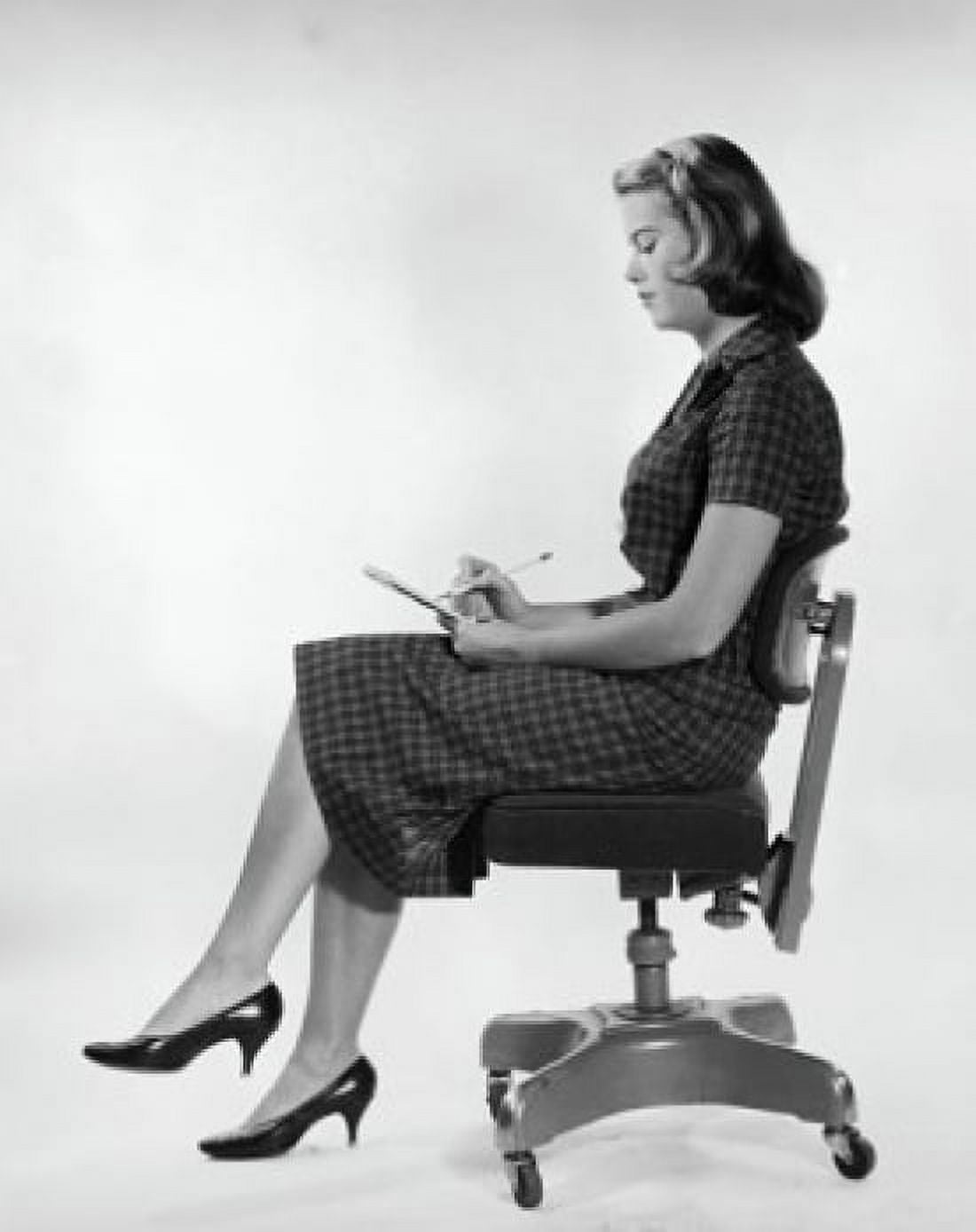 Side profile of a young woman writing on a notepad Canvas Art - (24 x 36)