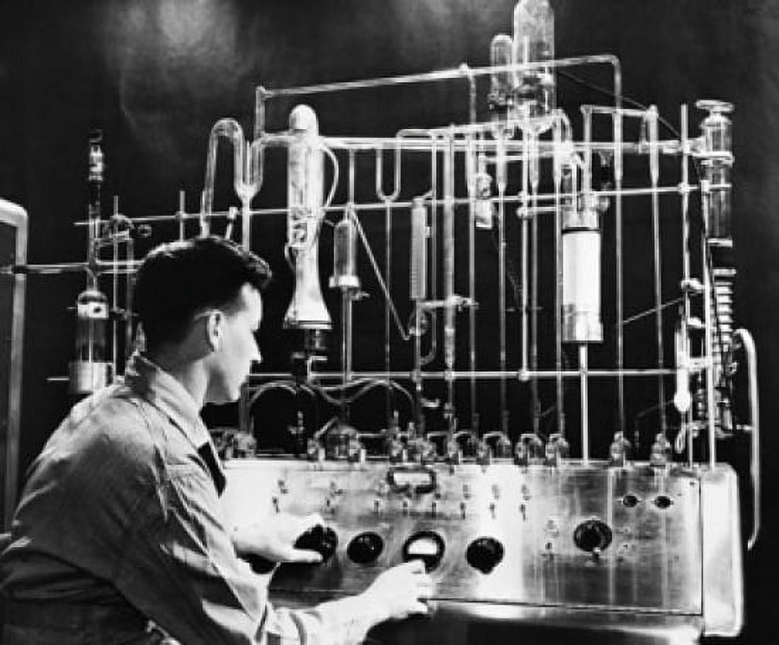 Side profile of an engineer operating Vacuum Fusion Gas Analyzer in a laboratory Canvas Art - (18 x 24)